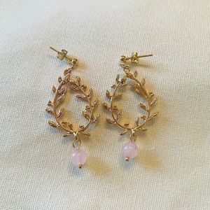 Lightweight gold color leaf earrings with hanging pink bead